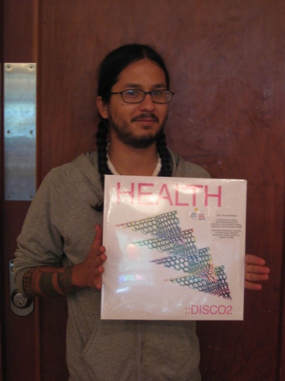 Aaron holds Health: Disco2