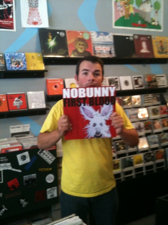 Zac Ives holds NoBunny: Love Visions (Goner Records)