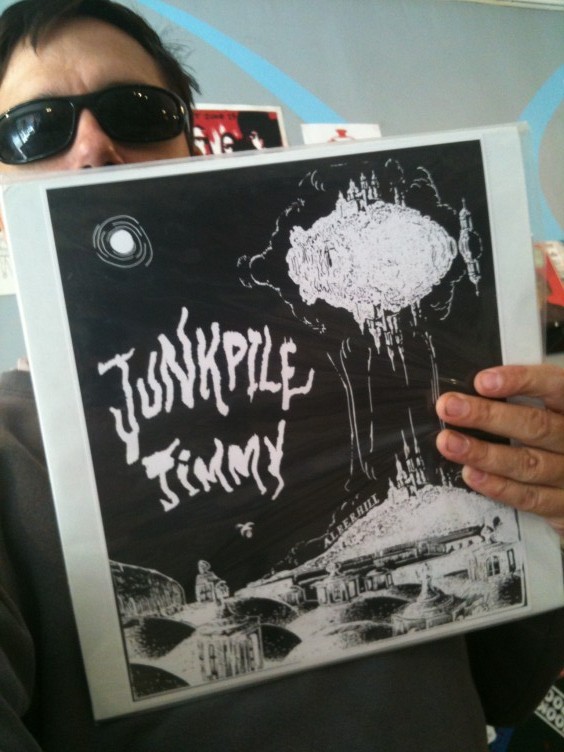 Goner Records co-owner Eric Friedl holds Junkpile Jimmy: Alberhill (self-released)