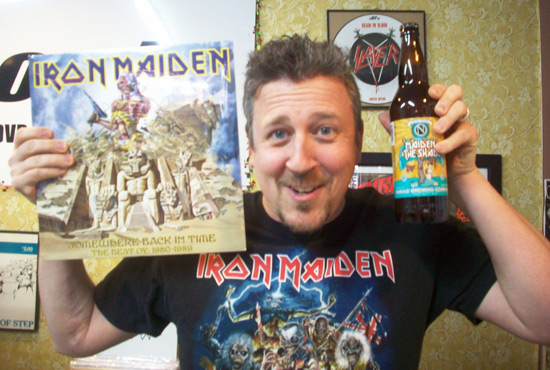 Brad Richman holds Iron Maiden's Somewhere Back in Time