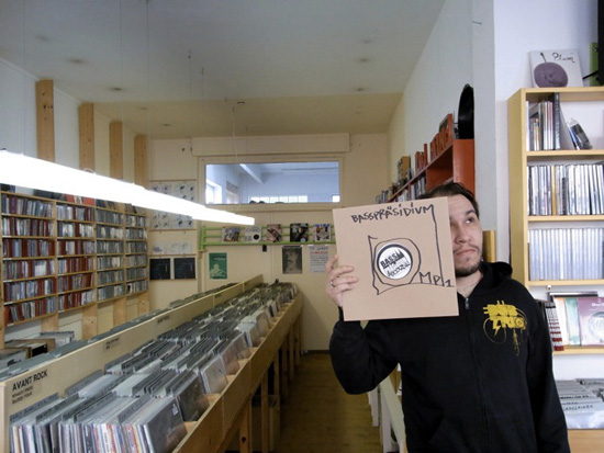 Michael Bollhöfer holds the Basspräsidium Compilation Vol.1 (Basspräsidium/A-Musik, 2010)