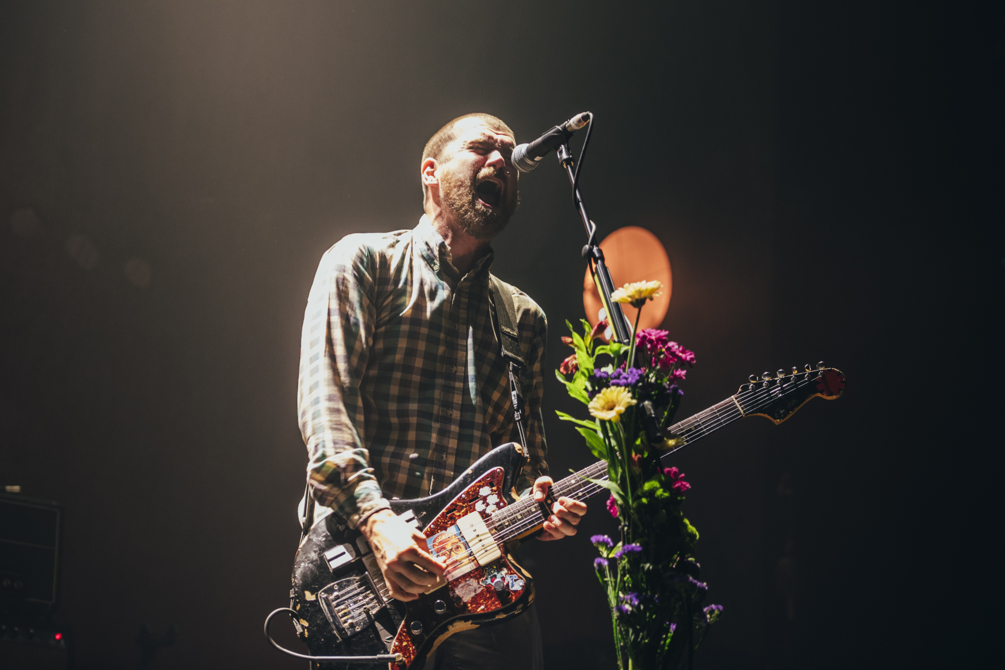 Jesse Lacey, guitar and vocalist of Brand New, singing passionately